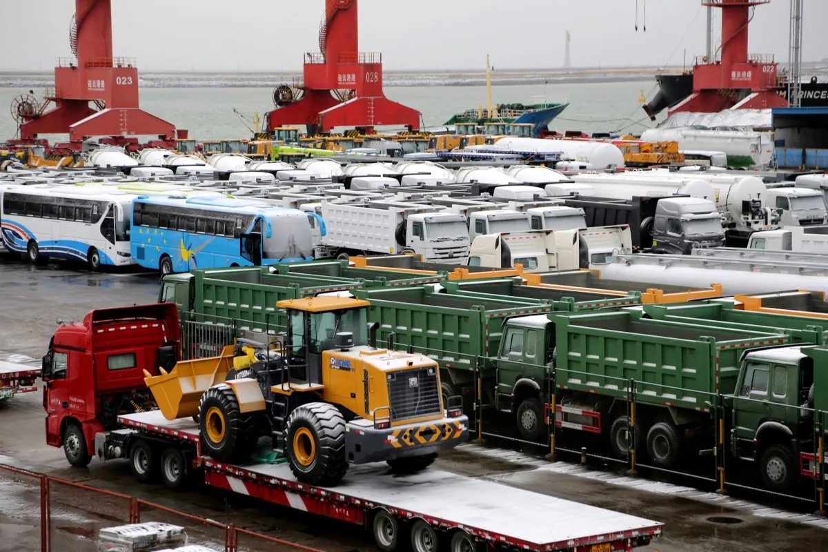 Snow-covered trucks, buses and machineries are seen at a port in Lianyungang, Jiangsu Province, China on Jan. 31, 2019. (Reuters)