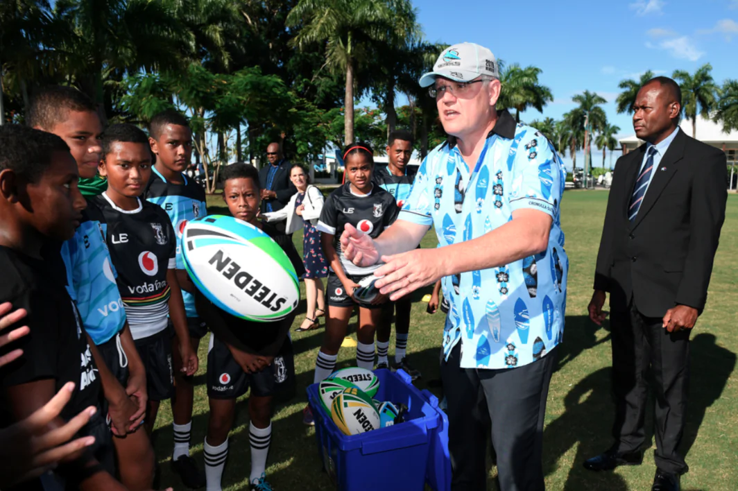Australian Prime Minister Scott Morrison meets with young rugby league players in Suva, Fiji, January 18, 2019. Picture taken Jan. 18, 2019. (AAP Image/Dan Himbrechts/Reuters)