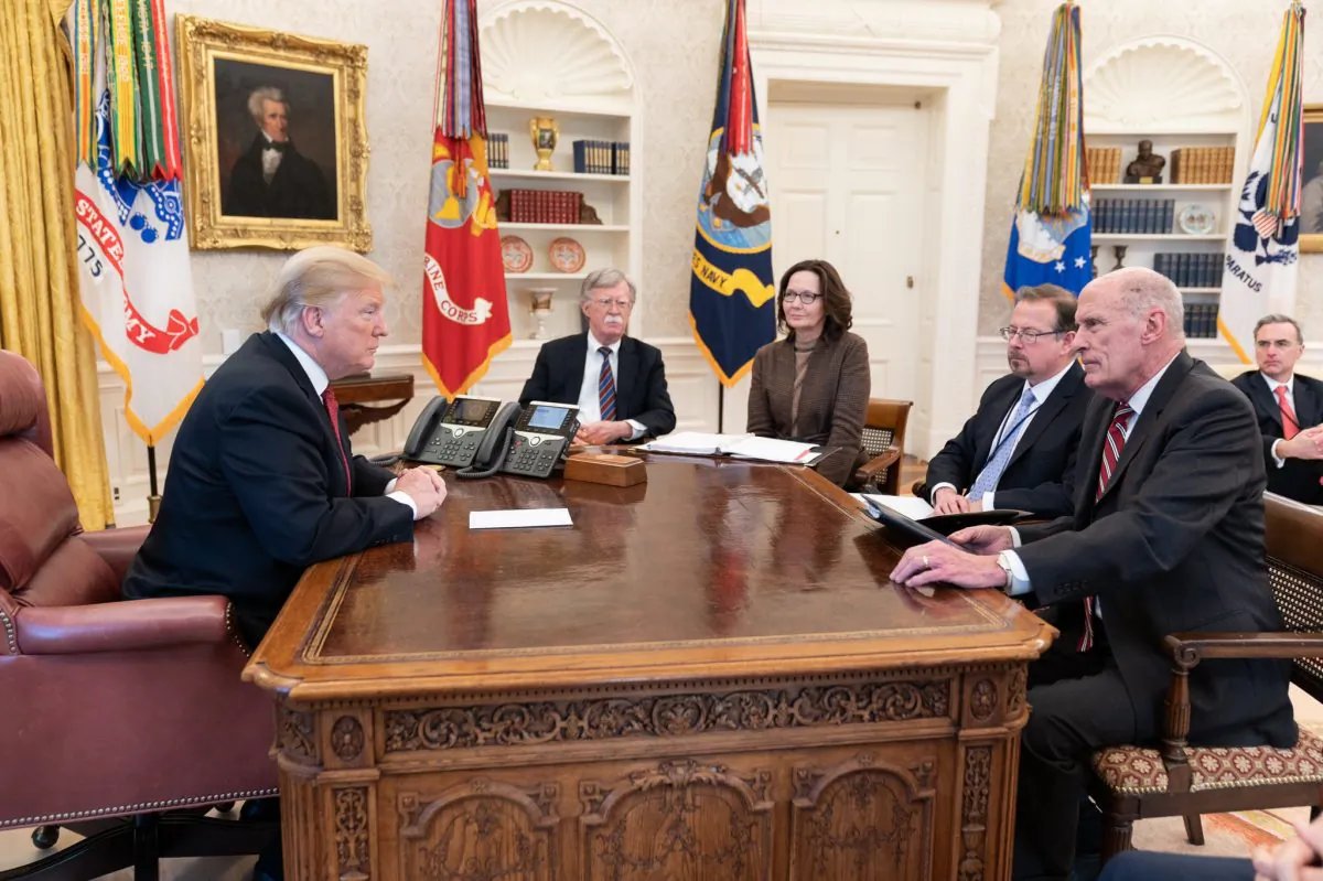 President Donald Trump (L) with heads of intelligence agencies, including Director of National Intelligence Dan Coats (R) and CIA Director Gina Haspel (3rd L) in the Oval Office in the White House on Jan. 31, 2019. (White House photo)