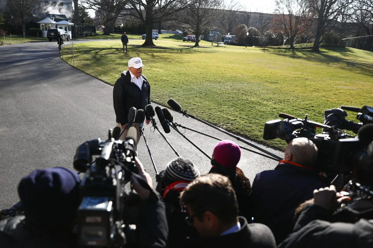 President Donald Trump speaks to media before departing the White House en route to the U.S.-Mexico border in McAllen, Texas, on Jan. 10, 2019. (Holly Kellum/NTD)