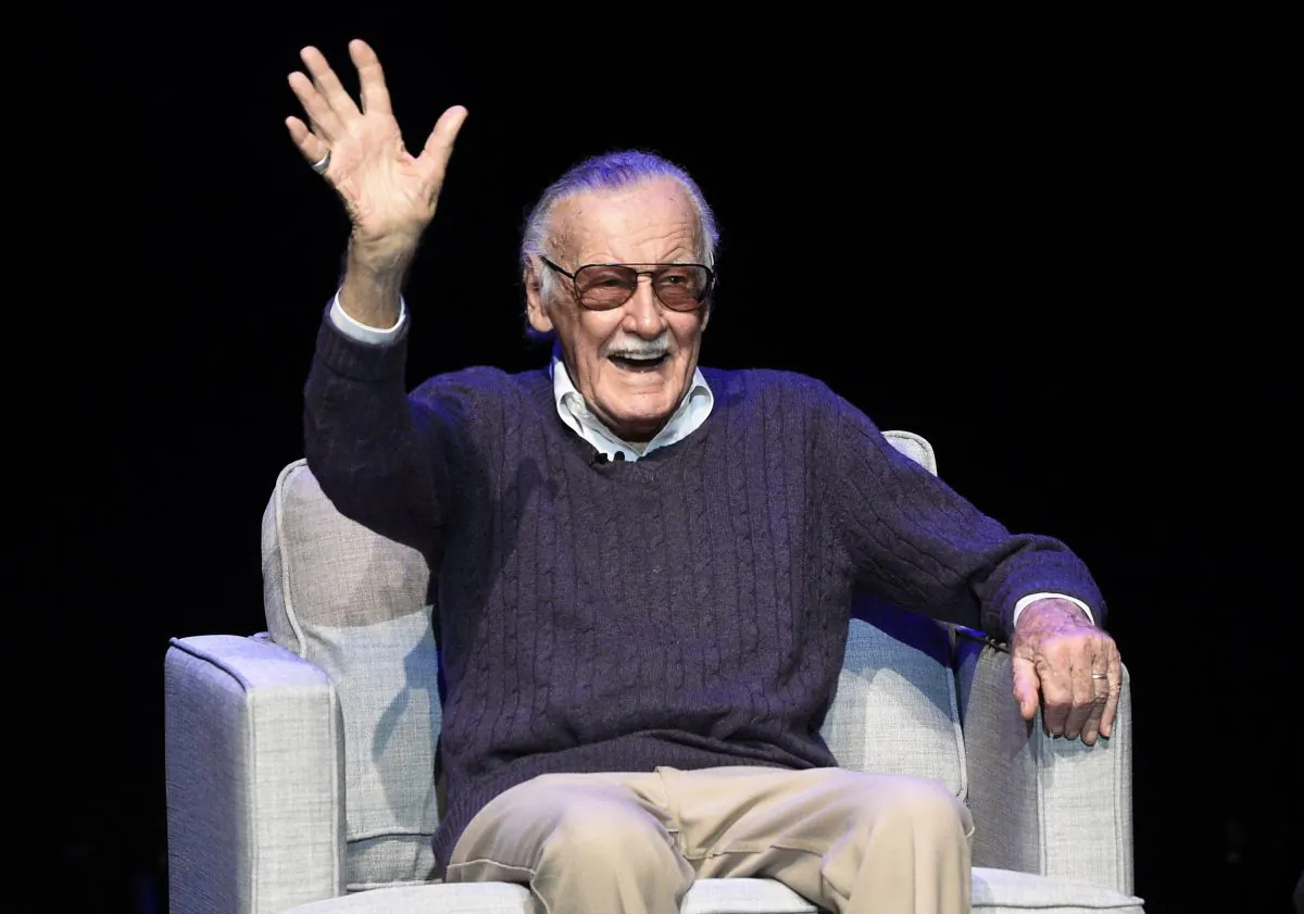 Comic book writer Stan Lee waves to the audience after being introduced onstage at the "Extraordinary: Stan Lee" tribute event at the Saban Theatre in Beverly Hills, Calif., on Aug. 22, 2017. (Chris Pizzello/Invision/AP)