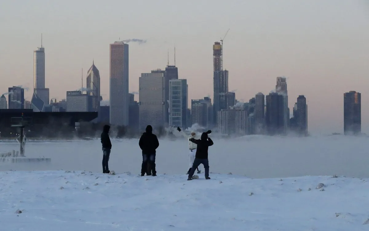 People enjoy at the Lake Michigan at 31st Street Harbor in Chicago, on Jan. 30, 2019. (Nam Y. Huh/AP)