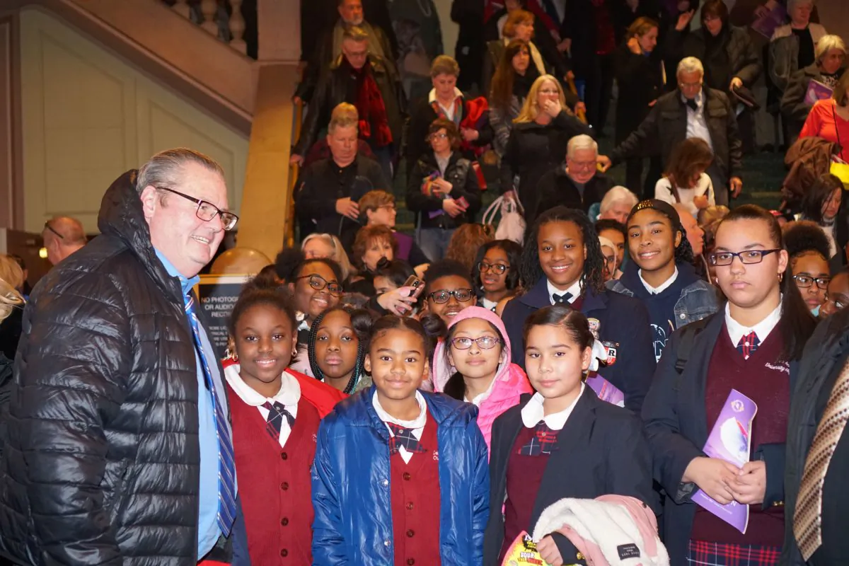 Scott Lunn with students of LEAP Academy University Charter School at 
Merriam Theater in Camden, N.J., on Feb. 28, 2019. (Lily Sun/The Epoch Times)