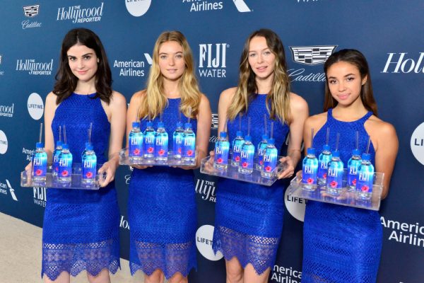 models hold Fiji water