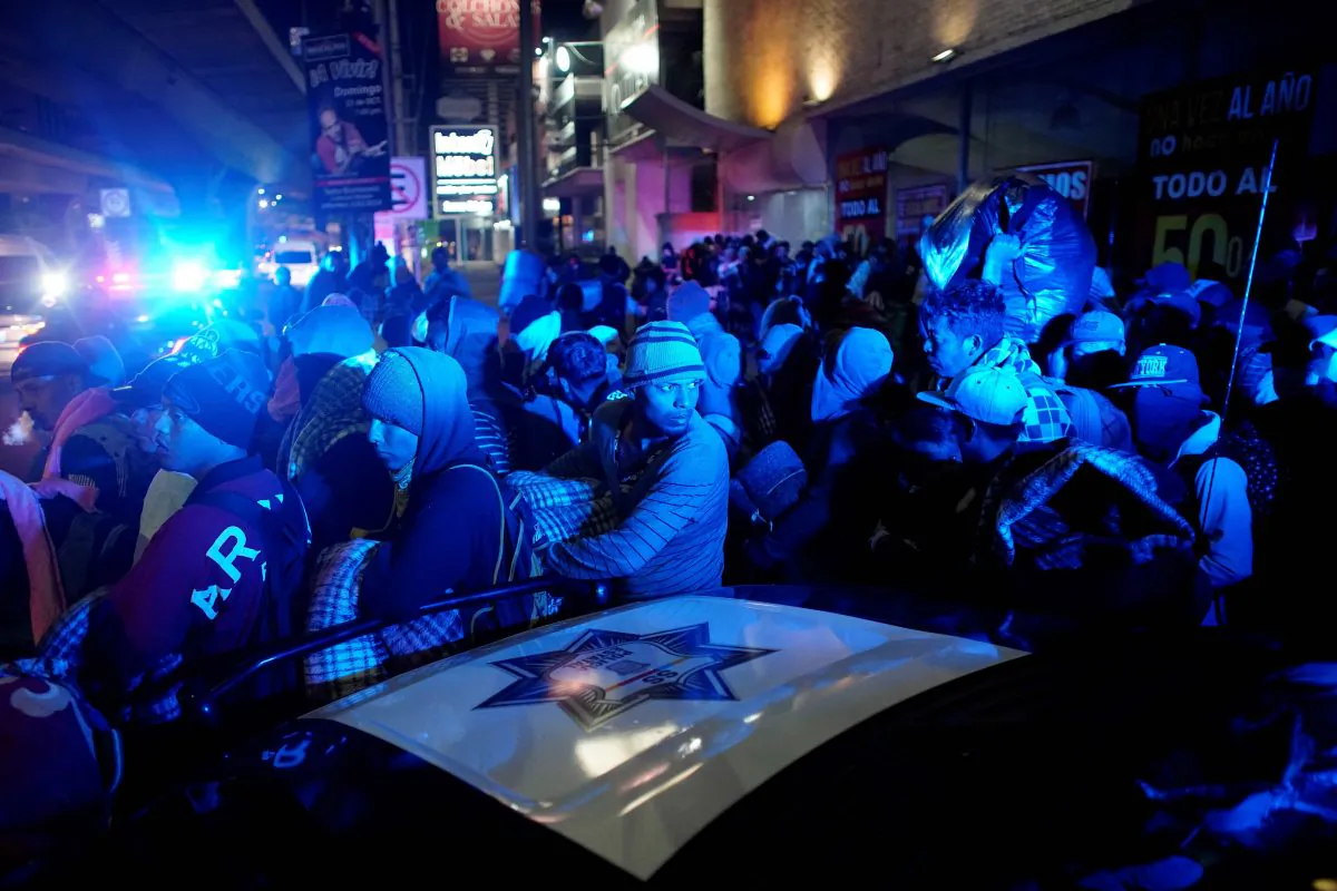 Migrants wait for transportation during their journey to the United States, in Mexico City, Mexico, on Jan. 31, 2019. (Alexandre Meneghini/Reuters)