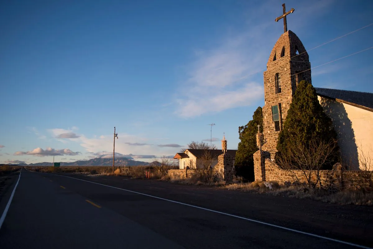 An abandoned Catholic church stands just off the road in Hachita, New Mexico, near the US–Mexico border on Feb. 19, 2017. (JIM WATSON/AFP/Getty Images)