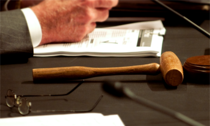 A gavel resting connected  a table. (Rod Lamkey/Getty Images)