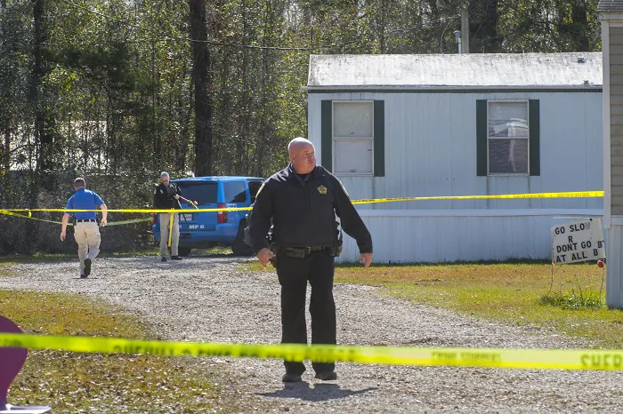 Investigators work the scene of a shooting in Livingston Parish in Louisiana. (Travis Spradling/The Advocate via AP)