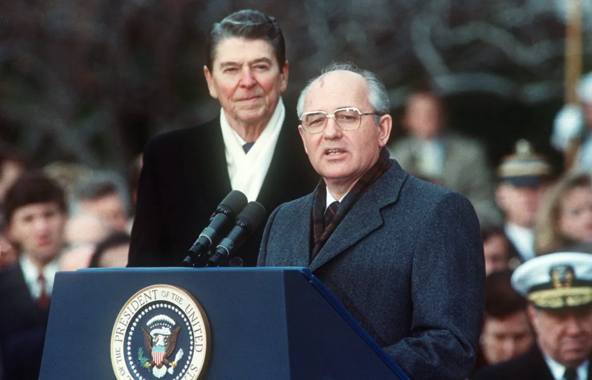 President Ronald Reagan (L) with Soviet leader Mikhail Gorbachev during welcoming ceremonies at the White House on the first day of their disarmament summit, on Dec. 8, 1987. (Jerome Delay/AFP/Getty Images)