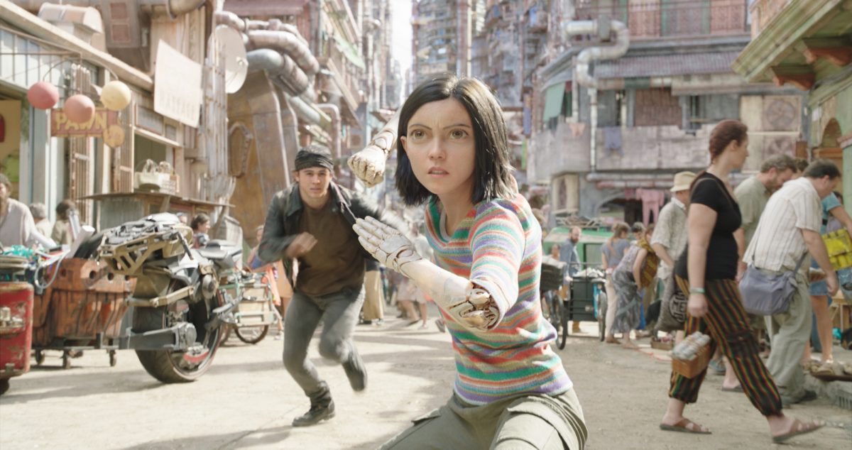 boy and cyborg girl in the street