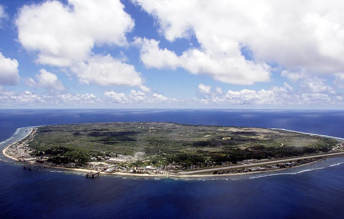 The island state of the Republic of Nauru awaits the arrival of 521 mainly Afghan refugees, 11 September 2001 which have been refused entry into Australia. (Torsten Blackwood/AFP/Getty Images)