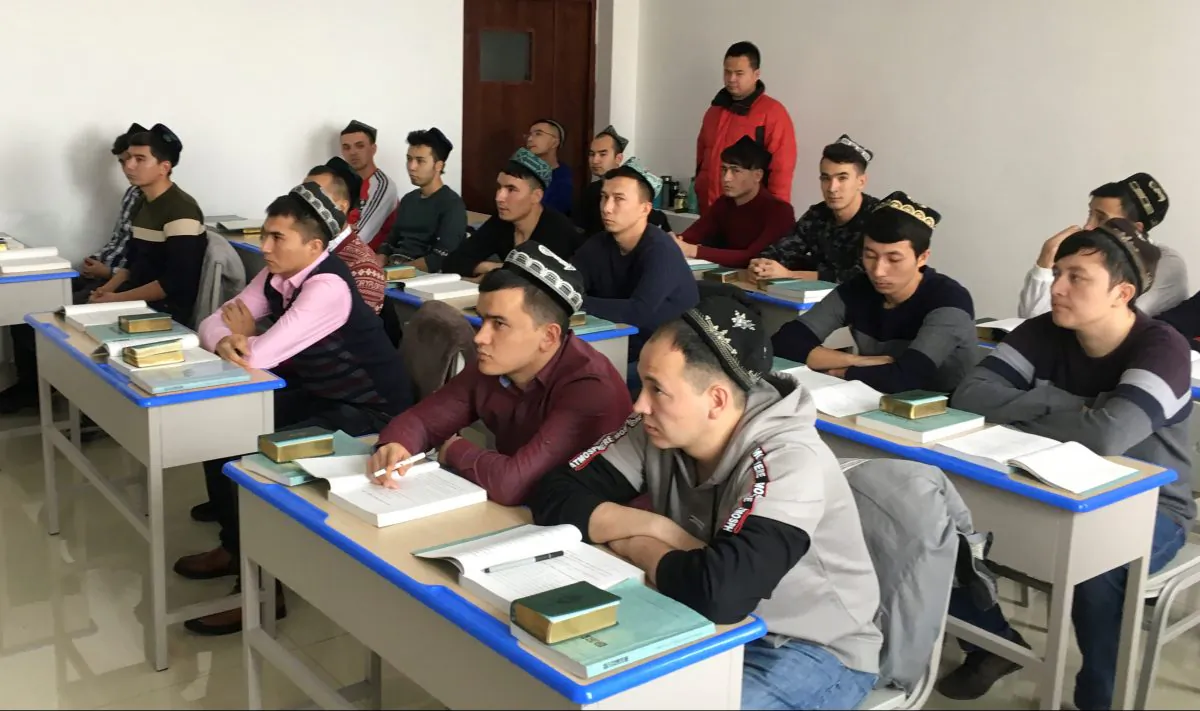 Islamic studies students attend a class at the Xinjiang Islamic Institute during a government organized trip in Urumqi, Xinjiang Uyghur Autonomous Region, China on Jan. 3, 2019. (Ben Blanchard/Reuters)