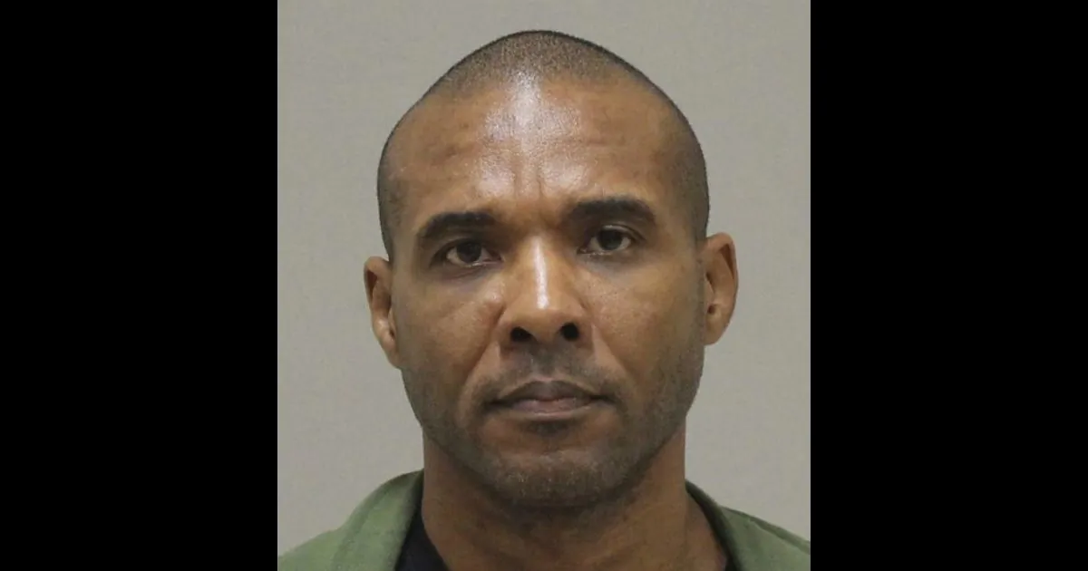 In this photo provided by the Kent County Michigan Sheriff's office, Cedric Marks is pictured in a booking photo in Grand Rapids, Mich., dated Jan. 8, 2019. (Kent County Michigan Sheriff's Office via AP)