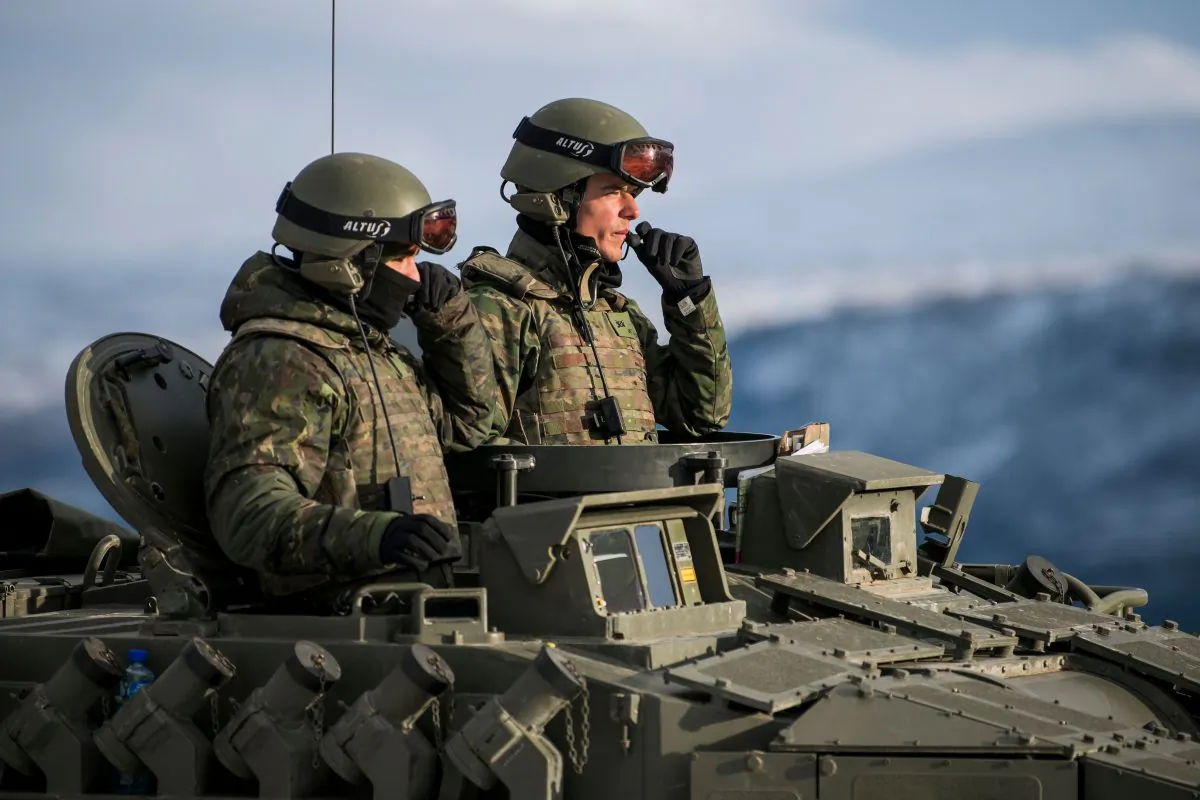 Spanish soldiers in a tank during an exercise to capture an airfield as part of the Trident Juncture 2018, a NATO-led military exercise, near the town of Oppdal, Norway, on Nov. 1, 2018 (JONATHAN NACKSTRAND/AFP/Getty Images)