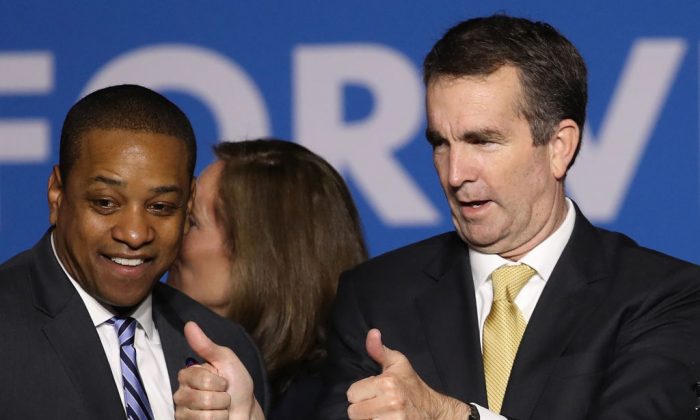 Gov.-elect Ralph Northam (R) and Lt. Gov.-elect Justin Fairfax greet supporters at an election night rally Nov. 7, 2017 in Fairfax, Virginia. (Win McNamee/Getty Images)