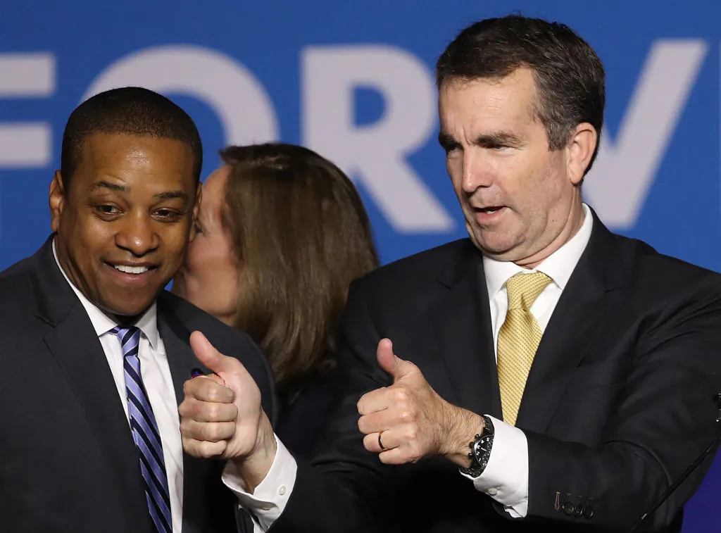 Gov.-elect Ralph Northam (R) and Lt. Gov.-elect Justin Fairfax greet supporters at an election night rally Nov. 7, 2017 in Fairfax, Virginia. (Win McNamee/Getty Images)