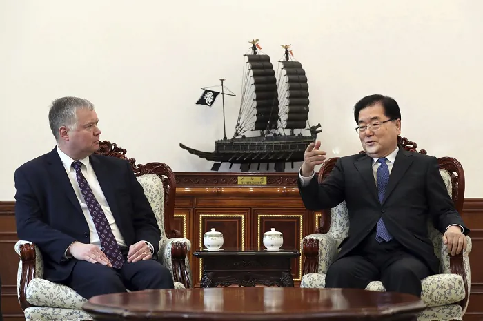 U.S. Special Representative for North Korea Stephen Biegun, left, talks with South Korean National Security Director Chung Eui-yong during a meeting at the Presidential Blue House in Seoul, South Korea, on Feb. 4, 2019. (South Korea Presidential Blue House via AP)
