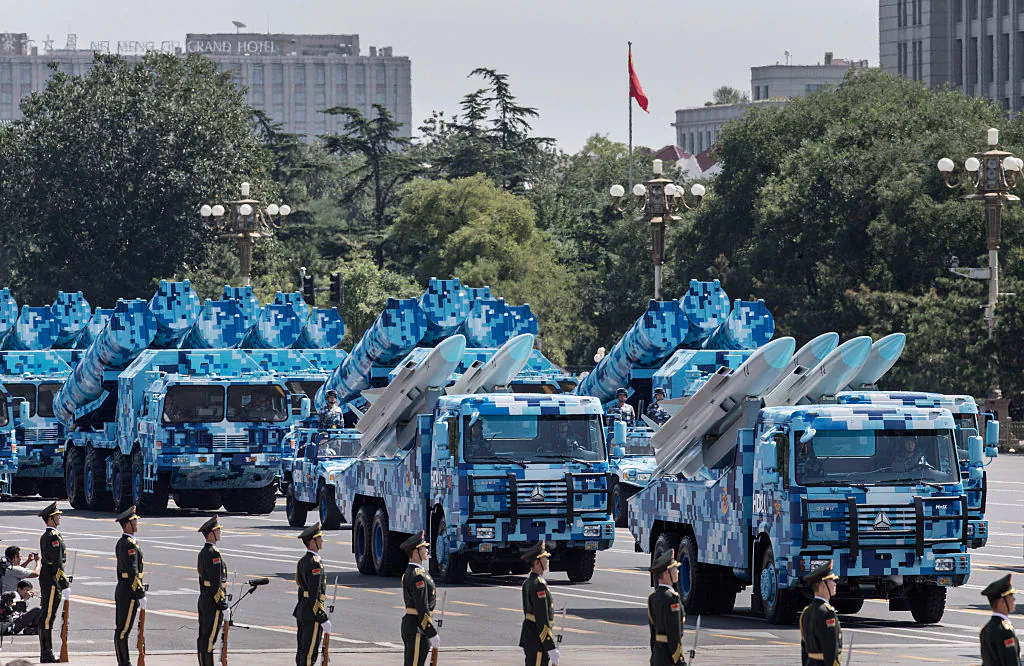 Chinese missiles are seen on trucks as they drive towards Tiananmen Square and the Forbidden City during a military parade in Beijing on Sept. 3, 2015. (Kevin Frayer/Getty Images)