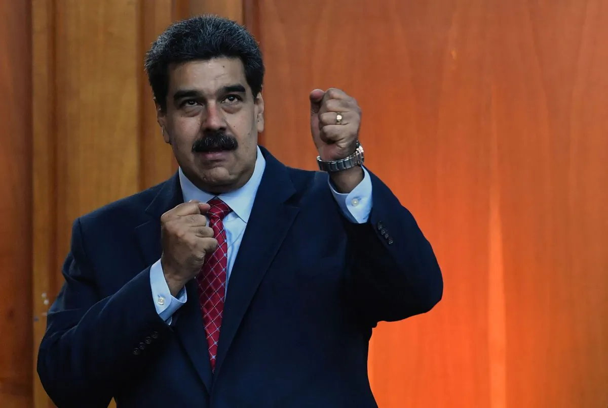Venezuela's President Nicolas Maduro leaves after offering a press conference in Caracas, on Jan. 25, 2019. (Yuri Cortez/AFP/Getty Images)