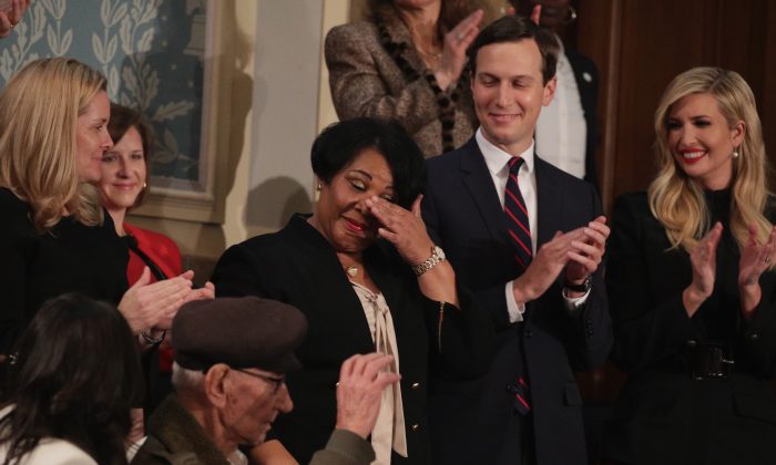 Alice Johnson (C), special guest of President Donald Trump, with Jared Kushner and Ivanka Trump, attends the State of the Union address in the chamber of the U.S. House of Representatives in Washington, on Feb. 5, 2019. (Alex Wong/Getty Images)