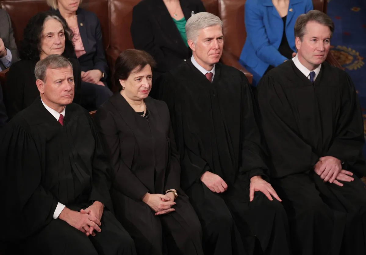 Supreme Court Justices John Roberts, Elena Kagan, Neil Gorsuch, and Brett Kavanaugh look on as President Donald Trump delivers the State of the Union address in the chamber of the U.S. House of Representatives on Feb. 5, 2019. (Alex Wong/Getty Images)