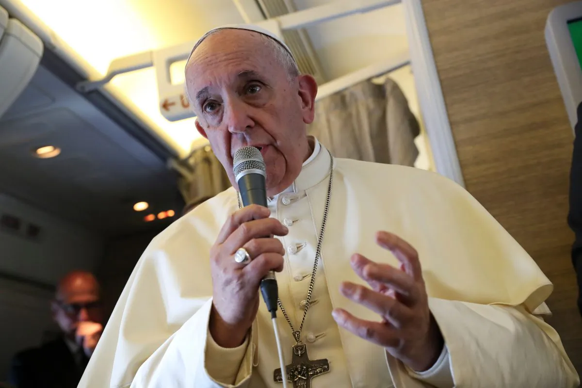 Pope Francis speaks to reporters aboard a plane on the way to Abu Dhabi on Feb. 3, 2019. (Tony Gentile/AFP/Getty Images)