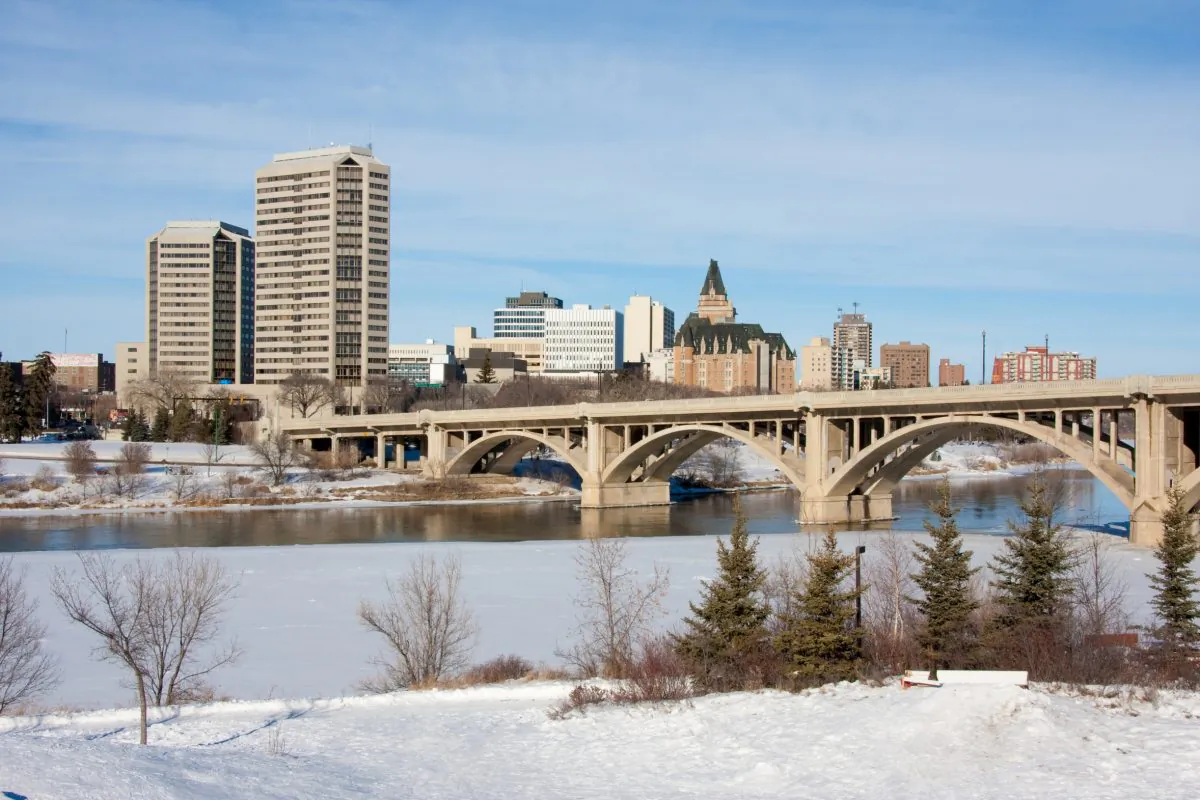 A view of the Broadway Bridge and downtown Saskatoon, Canada on a sunny day in winter. (Fotolia)
