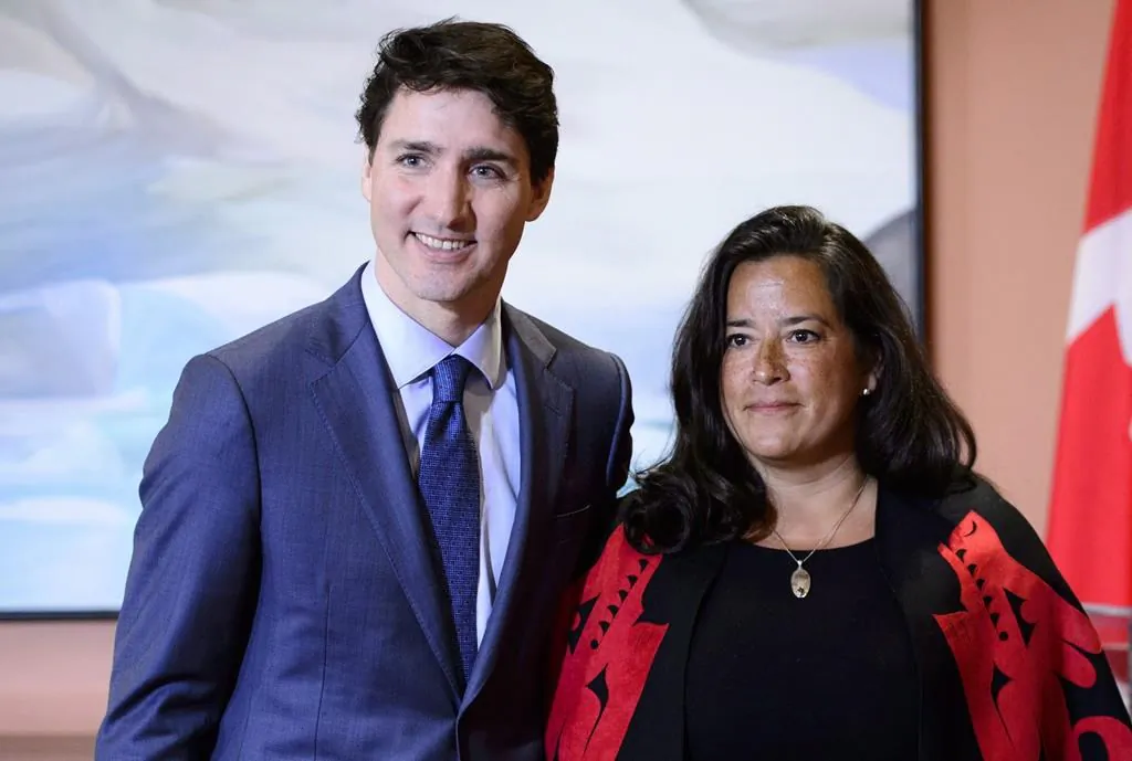 Prime Minister Justin Trudeau and Veterans Affairs Minister Jodie Wilson-Raybould attend a swearing in ceremony at Rideau Hall in Ottawa on Jan. 14. The Globe and Mail says former justice minister Wilson-Raybould disappointed the Prime Minister's Office by refusing to help SNC-Lavalin avoid a criminal prosecution. (The Canadian Press/Sean Kilpatrick)