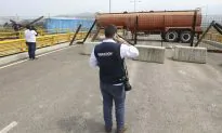 Venezuela Military Barricades Key Bridge to Stop Aid and Food