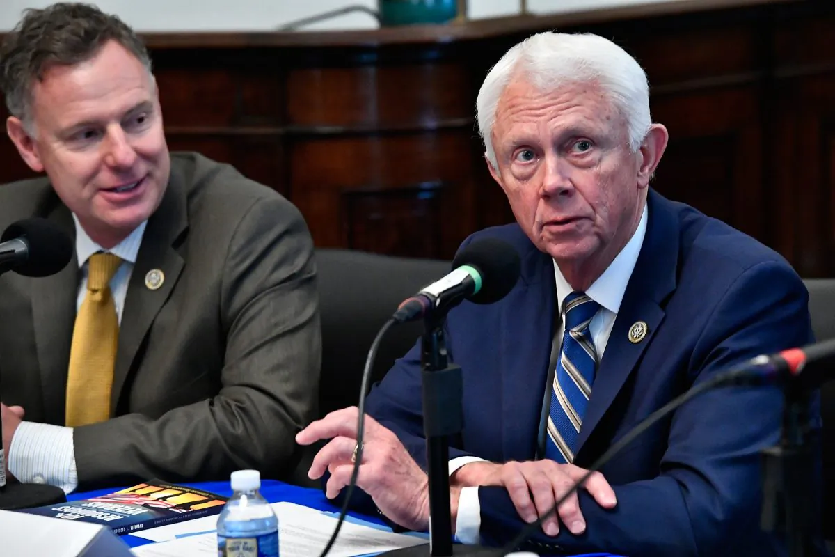 U.S. Rep Scott Peters (D-Calif.) (L) and Rep. Jack Bergman (R-Mich.) appear on Urban View's Helping Our Heroes Special, moderated by SiriusXM host Jennifer Hammond at the Cannon Building on Capitol Hill on May 16, 2018 in Washington, DC.  (Larry French/Getty Images for SiriusXM)