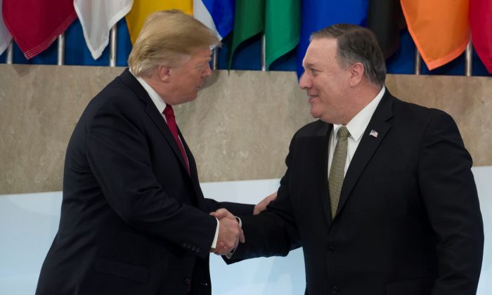 President Donald Trump, (L) with Secretary of State Mike Pompeo before speaking at the Global Coalition to Defeat ISIS meeting, at the State Department, in Feb. 6, 2019. (Alex Brandon/AP Photo)