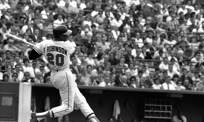 Baltimore Orioles' Frank Robinson at bat. Hall of Famer Frank Robinson, the first black manager in Major League Baseball and the only player to win the MVP award in both leagues. (AP)