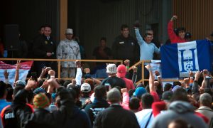 Migrant Caravan Detained in Old Factory, Across From Texas