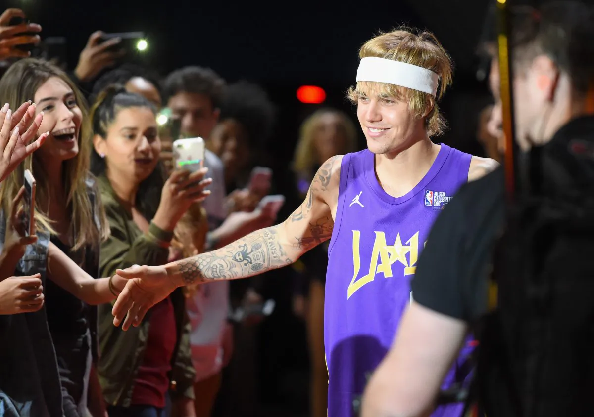 Justin Bieber takes the floor during player introductions prior to the 2018 NBA All-Star Game Celebrity Game at Los Angeles Convention Center in Los Angeles on Feb. 16, 2018. (Jayne Kamin-Oncea/Getty Images)