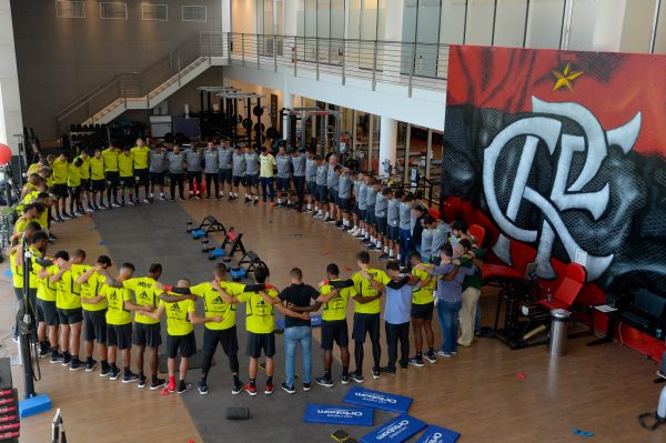Flamengo's soccer players pray at the club's training center, after part of it burned down, in Rio de Janeiro