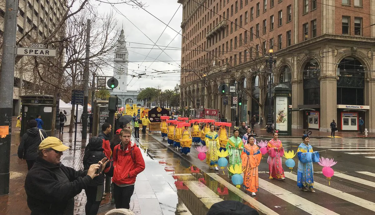 Falun Dafa practitioners march down Market Street in San Francisco to celebrate Chinese New Year on Feb. 9, 2019. (Ilene Eng/The Epoch Times)