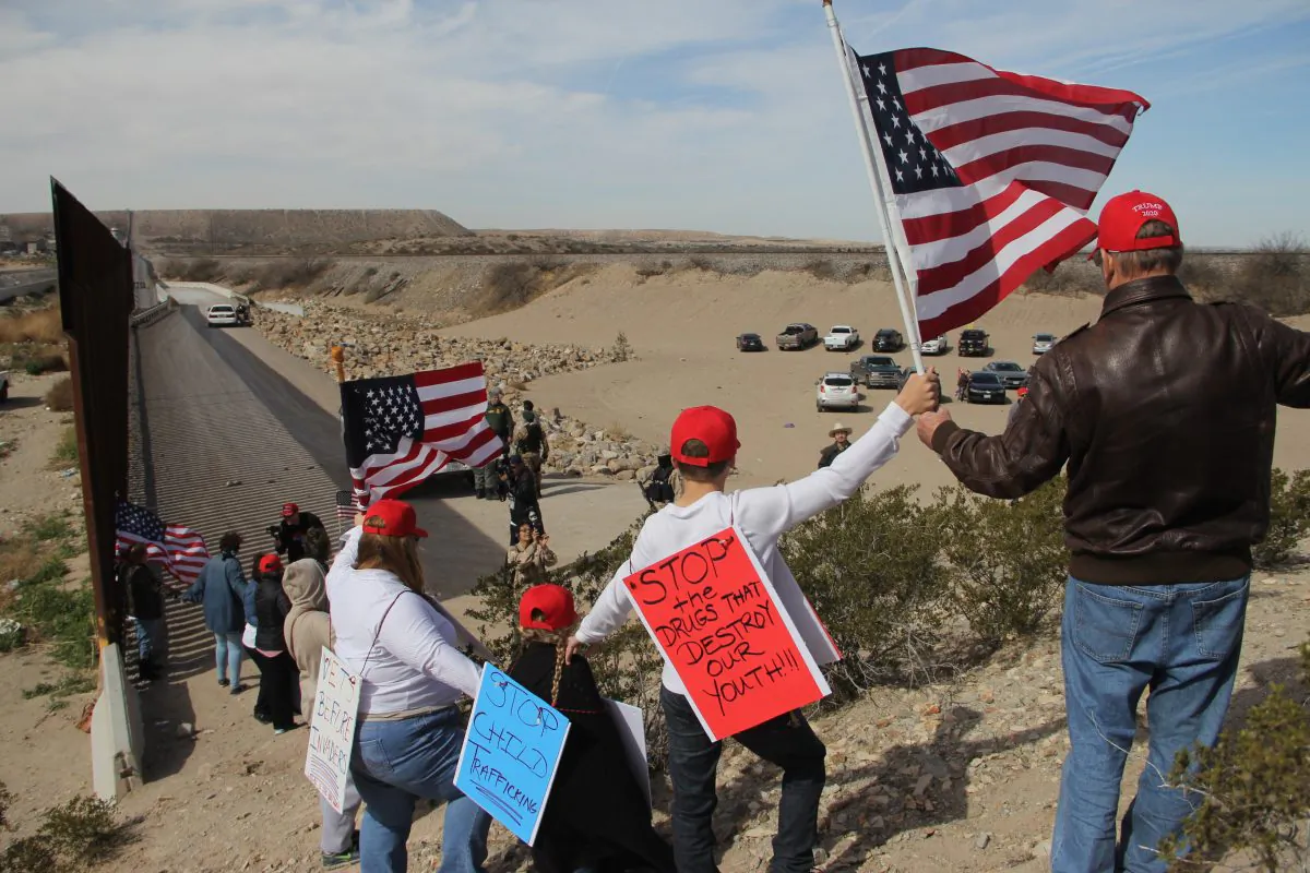 Supporters of increased security along the U.S.-Mexico border make a human wall to demonstrate their support for a border wall, at Sunland Park, N.M., on Feb. 9, 2019. (Hericka Martinez/AFP/Getty Images)