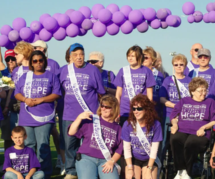 Cancer survivors are honored at a Relay for Life Event in Twinsburg, Ohio, in June 2009. Researchers found that many survivors do not like that label.
(KennethSponsler/Shutterstock)