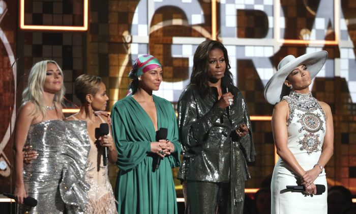 Lady Gaga, from left, Jada Pinkett Smith, Alicia Keys, Michelle Obama and Jennifer Lopez speak at the 61st annual Grammy Awards in Los Angeles on Feb. 10, 2019, (Matt Sayles/Invision/AP)