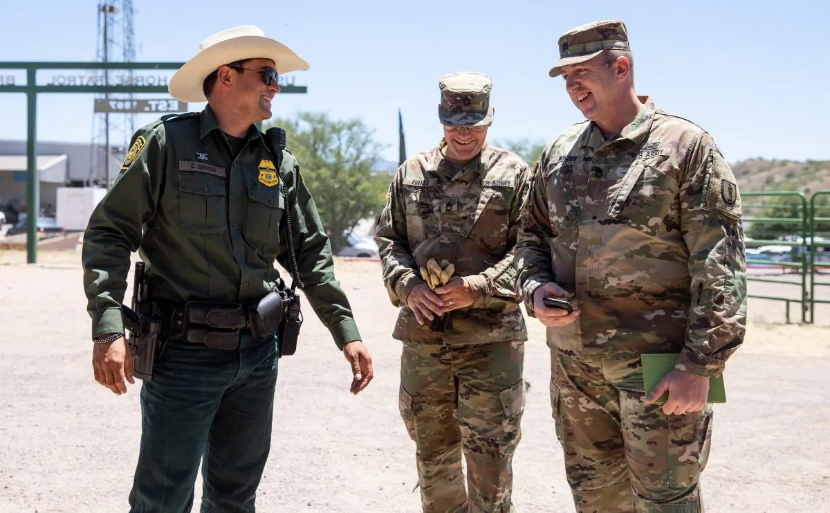 Border Patrol and National Guards at the horse stable area in the Tucson Sector Border Patrol headquarters in Nogales, Ariz., on May 23, 2018. (Samira Bouaou/The Epoch Times)