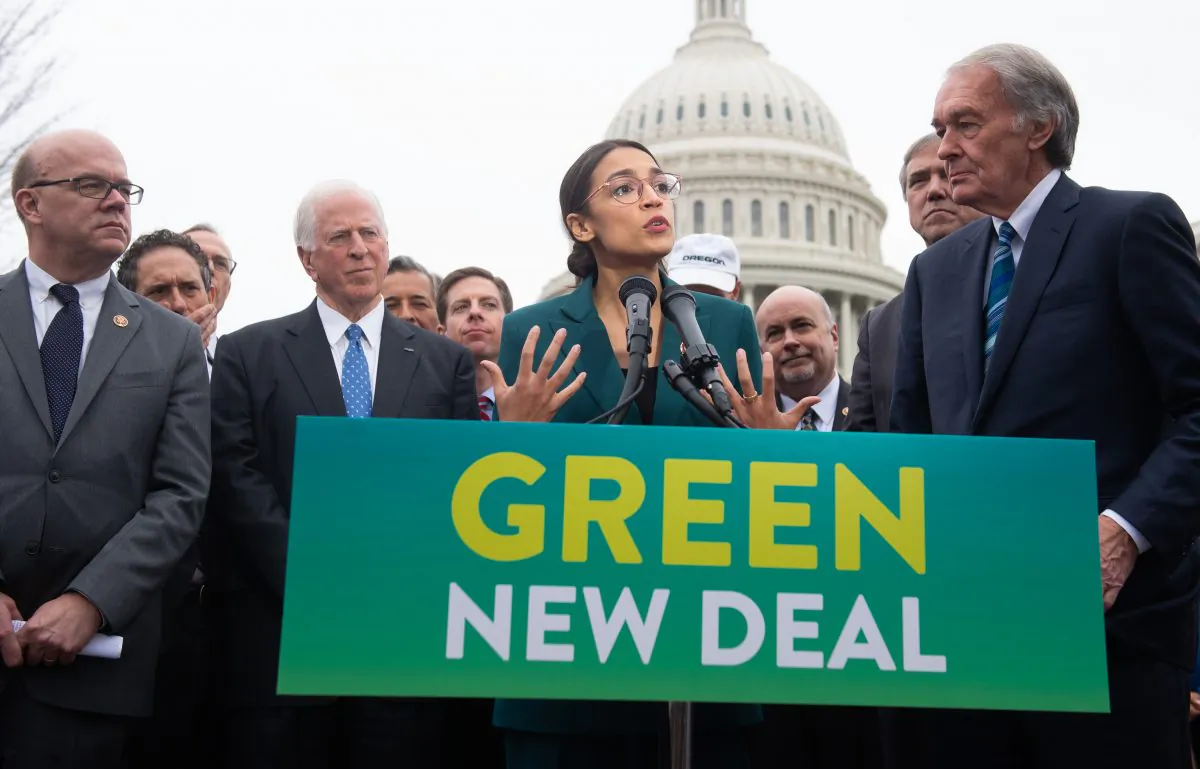 Rep. Alexandria Ocasio-Cortez (D-N.Y.) and Sen. Ed Markey (D-Mass.) (R) announce the Green New Deal outside the U.S. Capitol on Feb. 7, 2019. (SAUL LOEB/AFP/Getty Images)