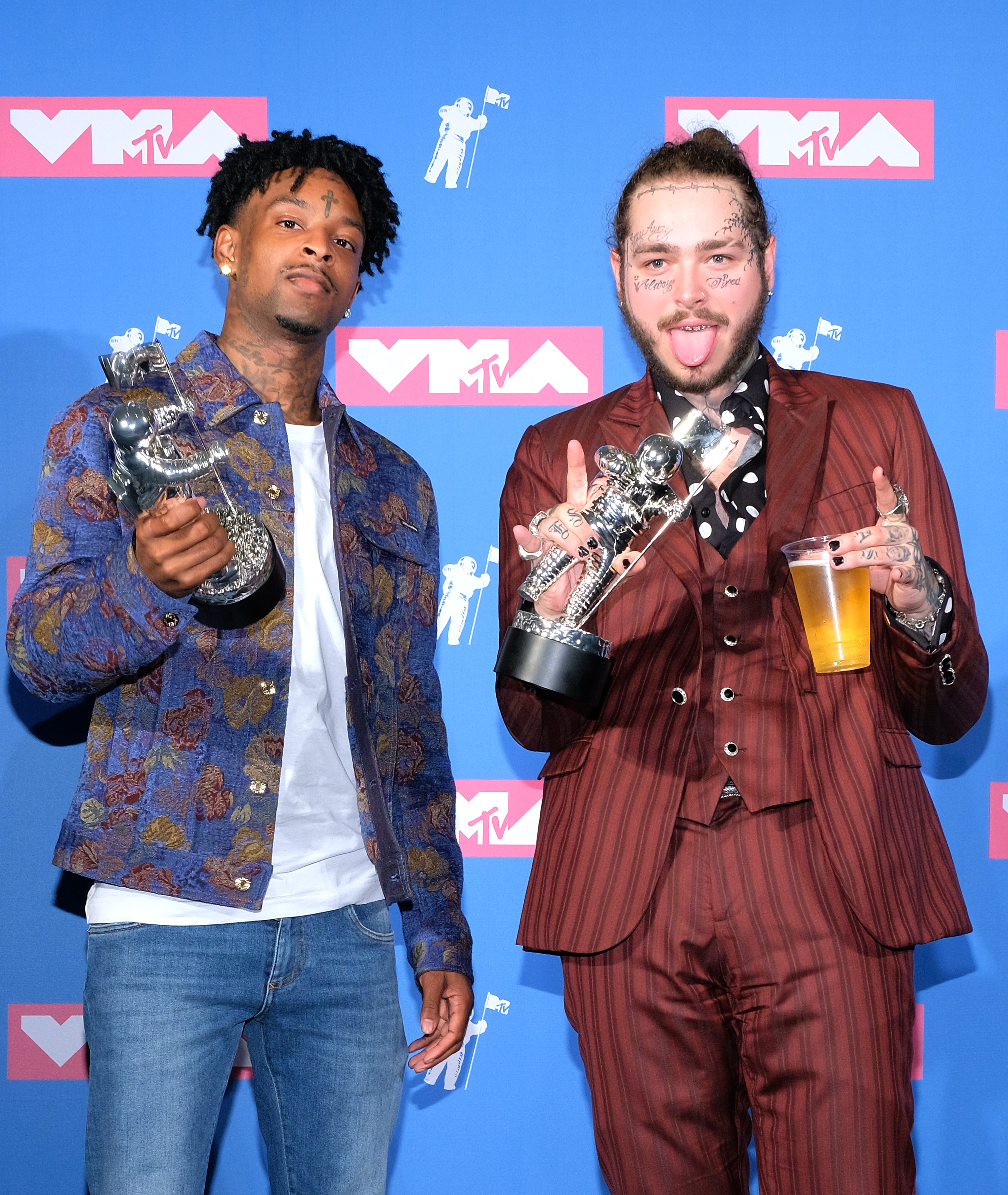 Savage and Post Malone pose with the Song of the Year award