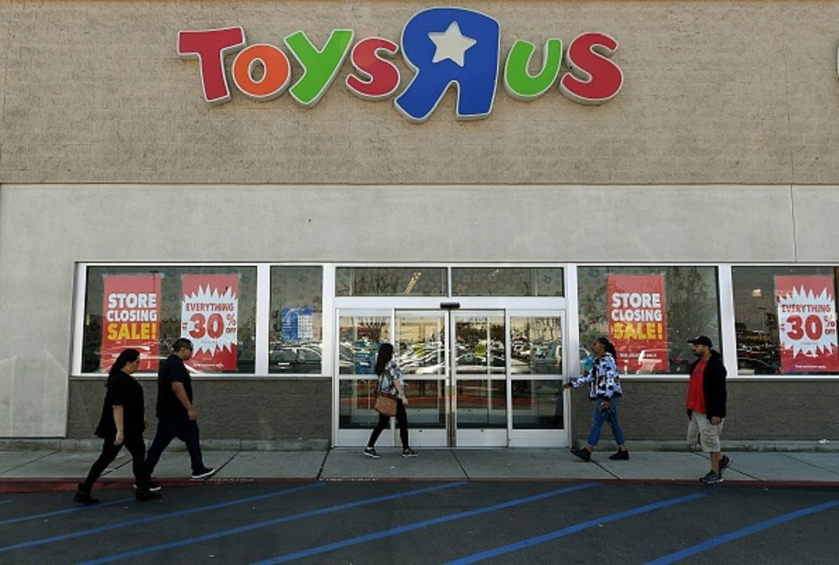 Customers shop at a Toys 'R' Us store