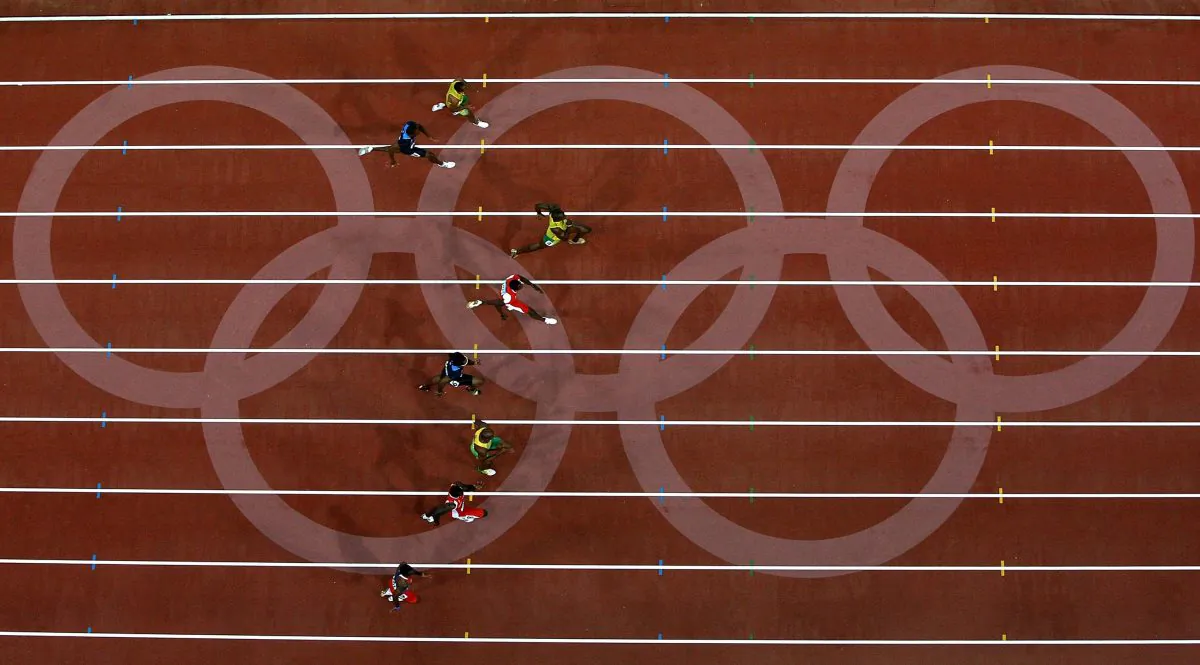 Usain Bolt of Jamaica leads the field on his way to winning the Men's 100 meter final in Beijing on Aug. 16, 2008, in Beijing, China. (Ezra Shaw/Getty Images)