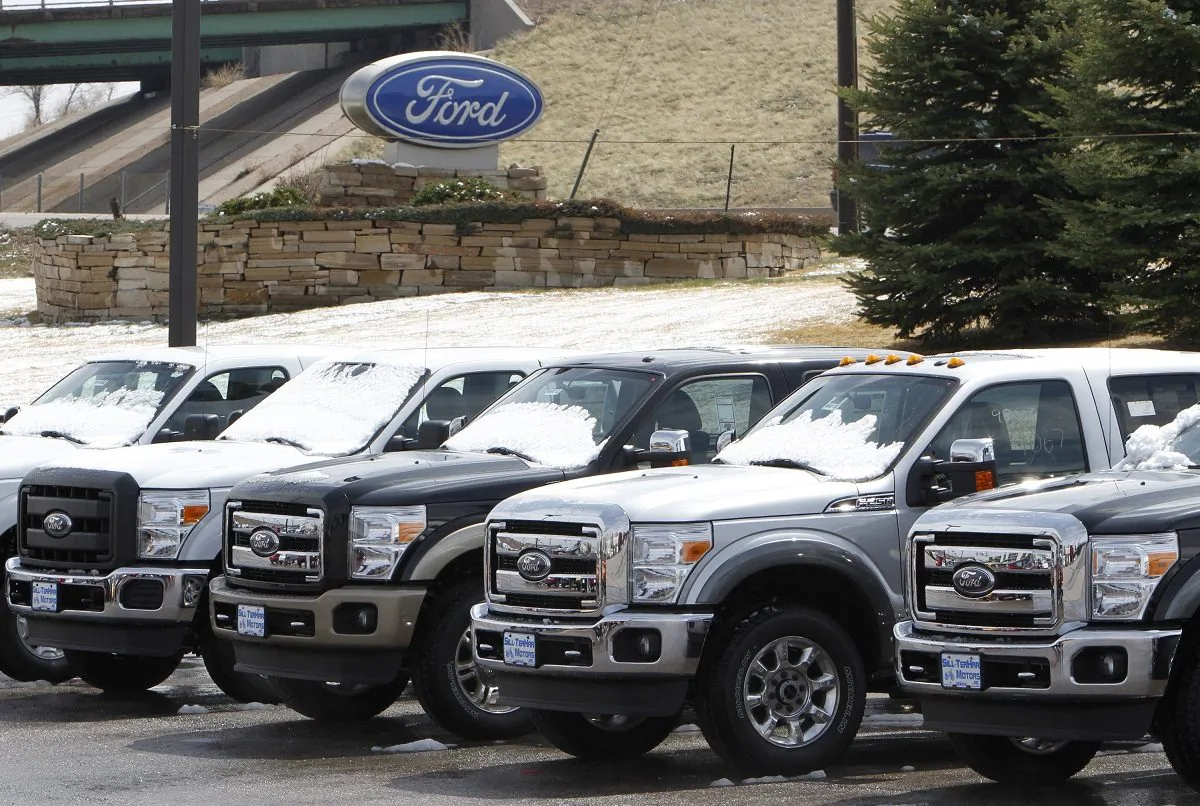 A row of new Ford F-150 pickup trucks are parked for sale at a Ford dealer in the Denver suburb of Broomfield, Colo., on April 14, 2011. (Rick Wilking/Reuters)