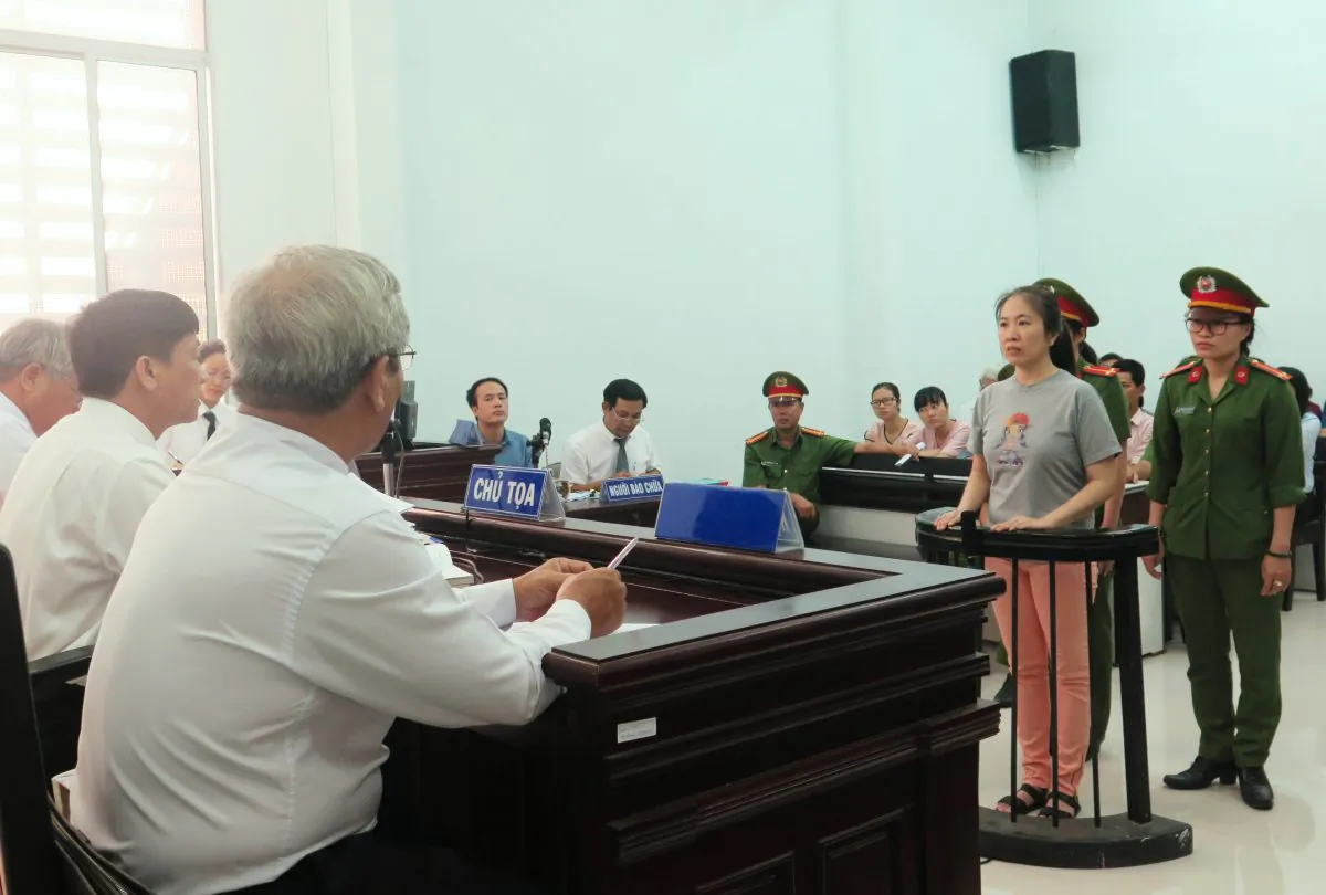 Vietnamese blogger Nguyen Ngoc Nhu Quynh (2nd R), also known as "Mother Mushroom," stands trial at a courthouse in the central city of Nha Trang on June 29, 2017. STR/AFP/Getty Images
