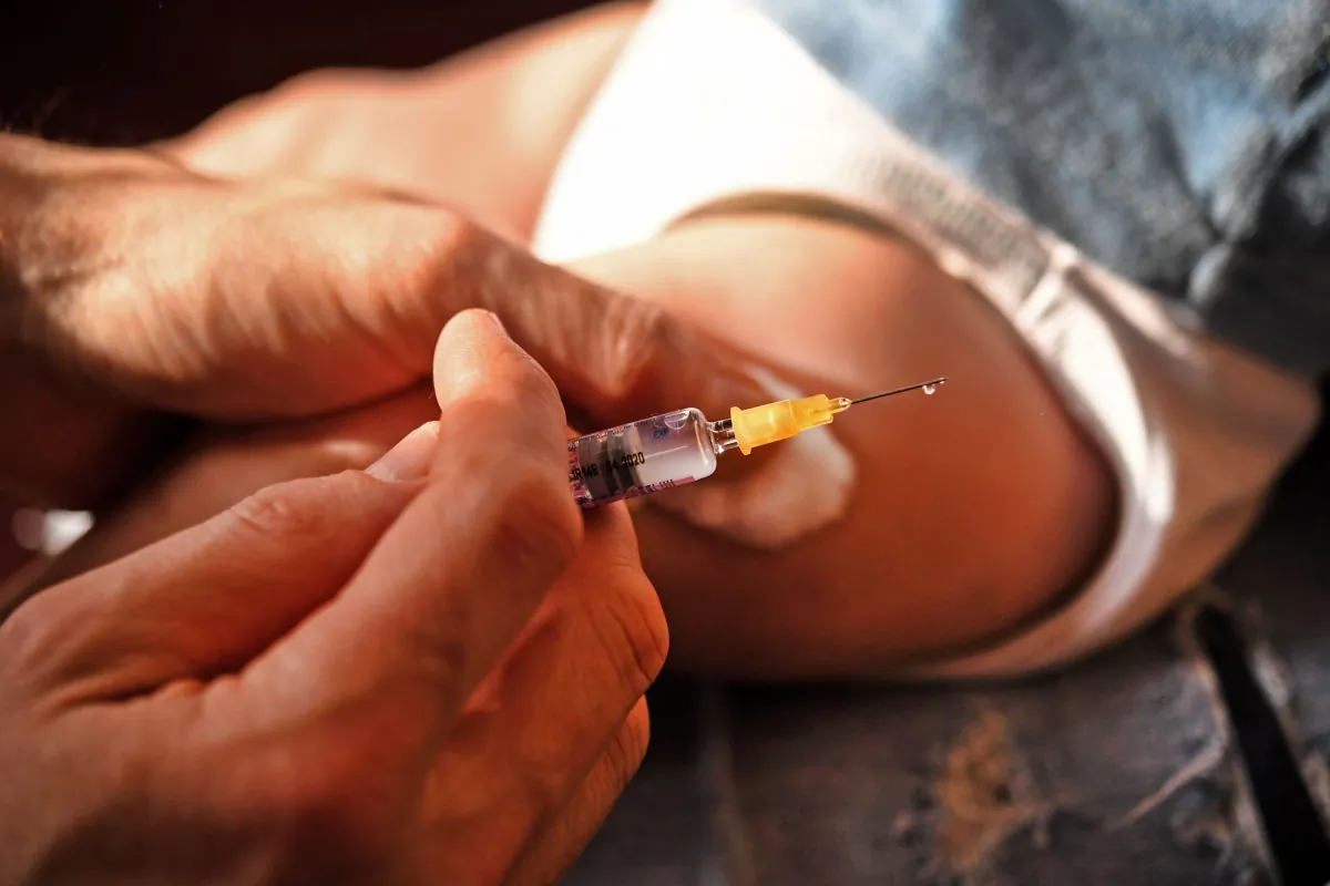 A doctor injecting a baby with a vaccine in a file photograph. (Fred Tanneau/AFP/Getty Images)