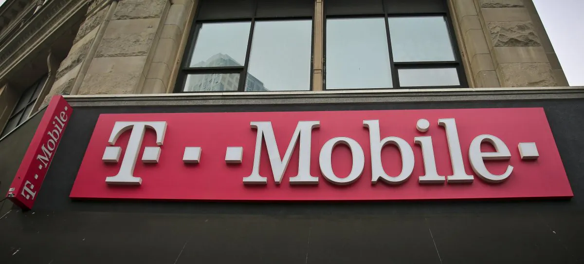 FILE—This April 30, 2018, file photo shows signage a T-Mobile store in N.Y. The top executives of T-Mobile and Sprint are making the case to Congress that their proposed $26.5 billion merger wouldn't hurt competition and jack up the prices consumers pay for wireless service. (Bebeto Matthews/AP)