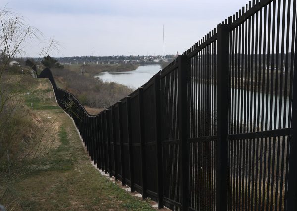 A border fence is seen near the Rio Grande which marks the boundary between Mexico and the United States in Eagle Pass