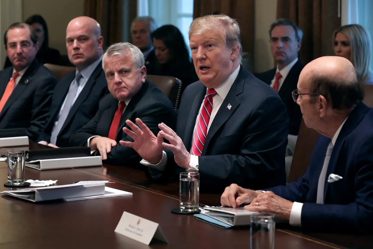 President Donald Trump talks to reporters during a meeting with members of his cabinet in the Cabinet Room at the White House on Feb. 12, 2019. (Chip Somodevilla/Getty Images)